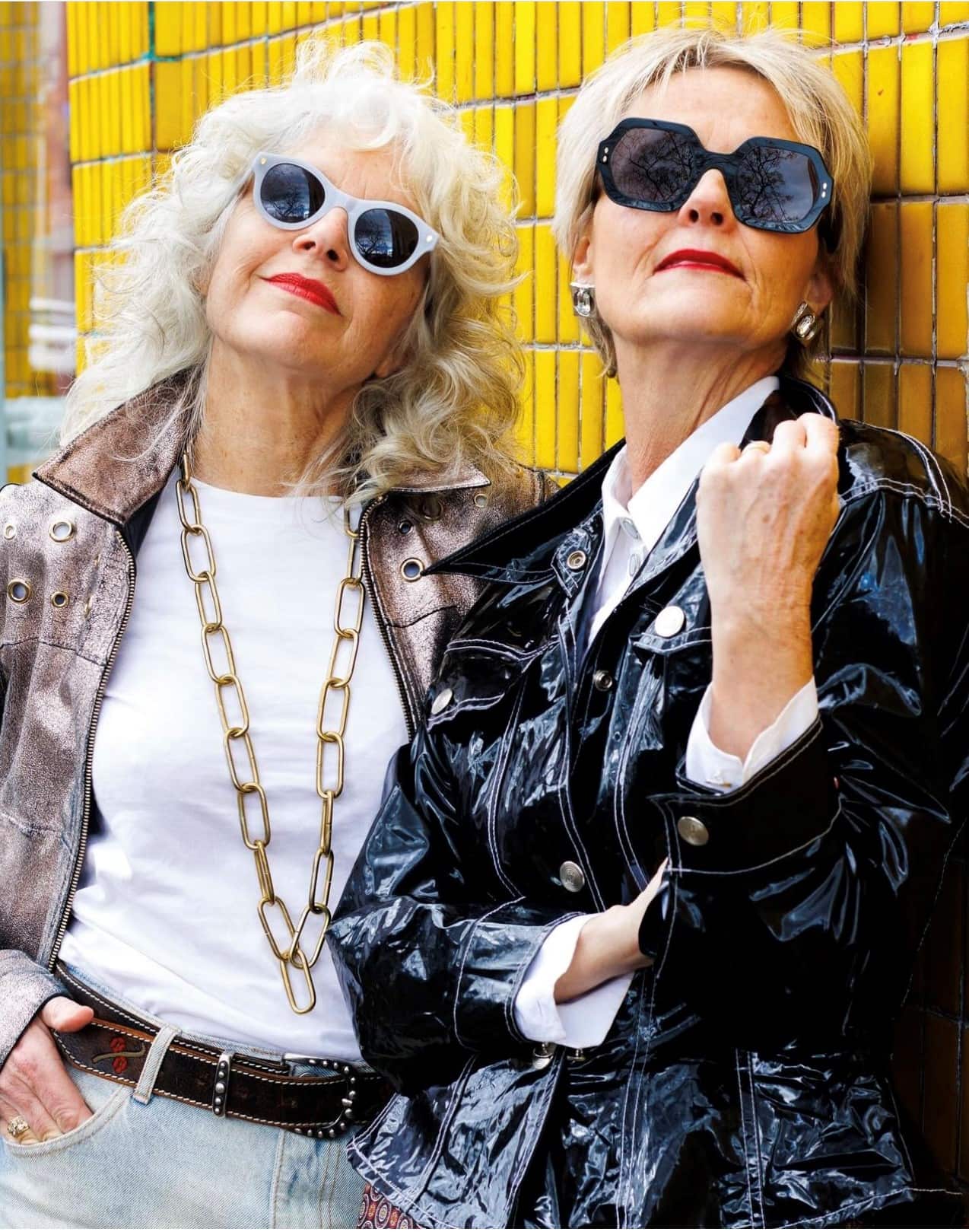 two older ladies posing for the camera