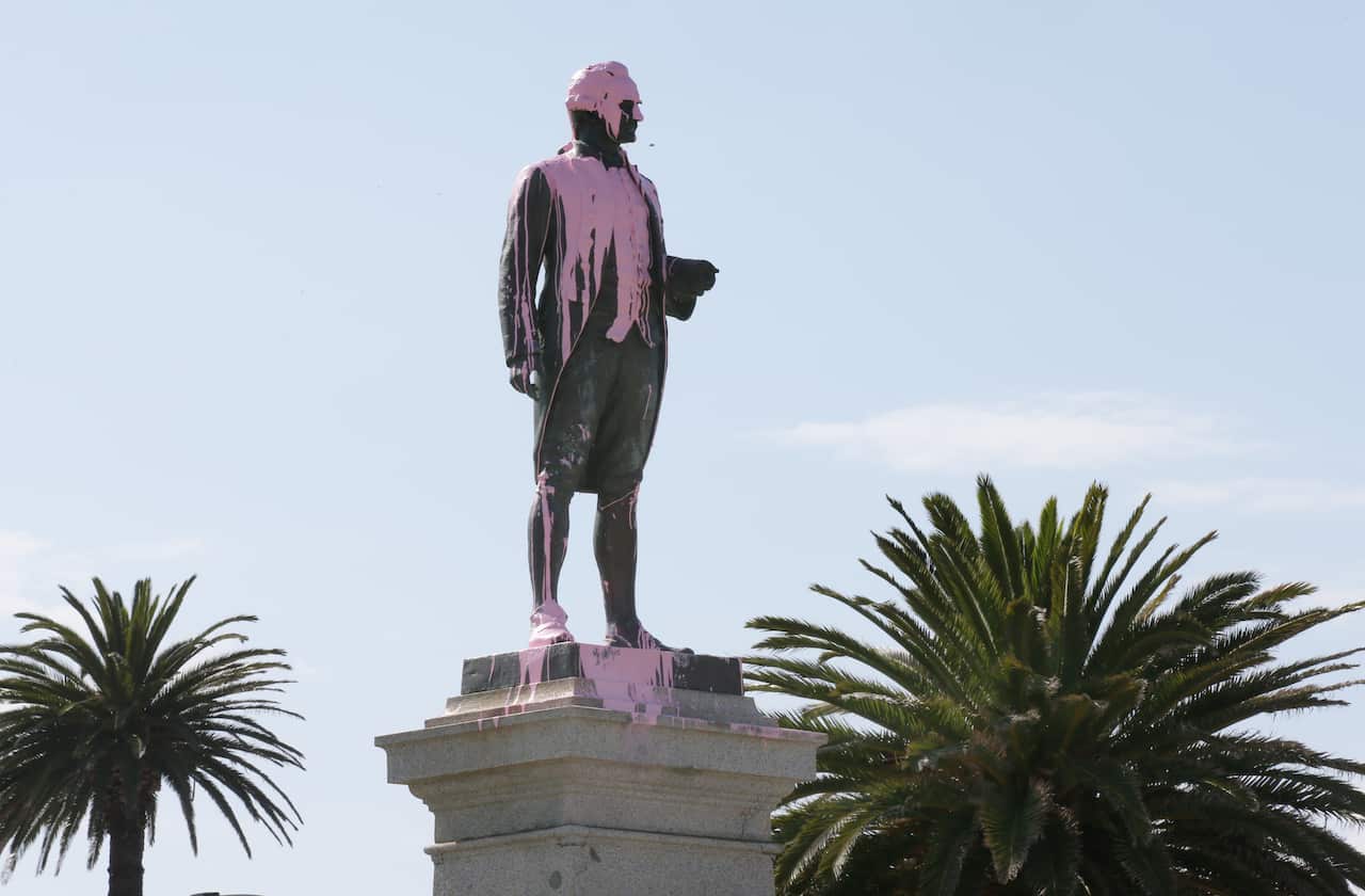A statue covered in pink paint