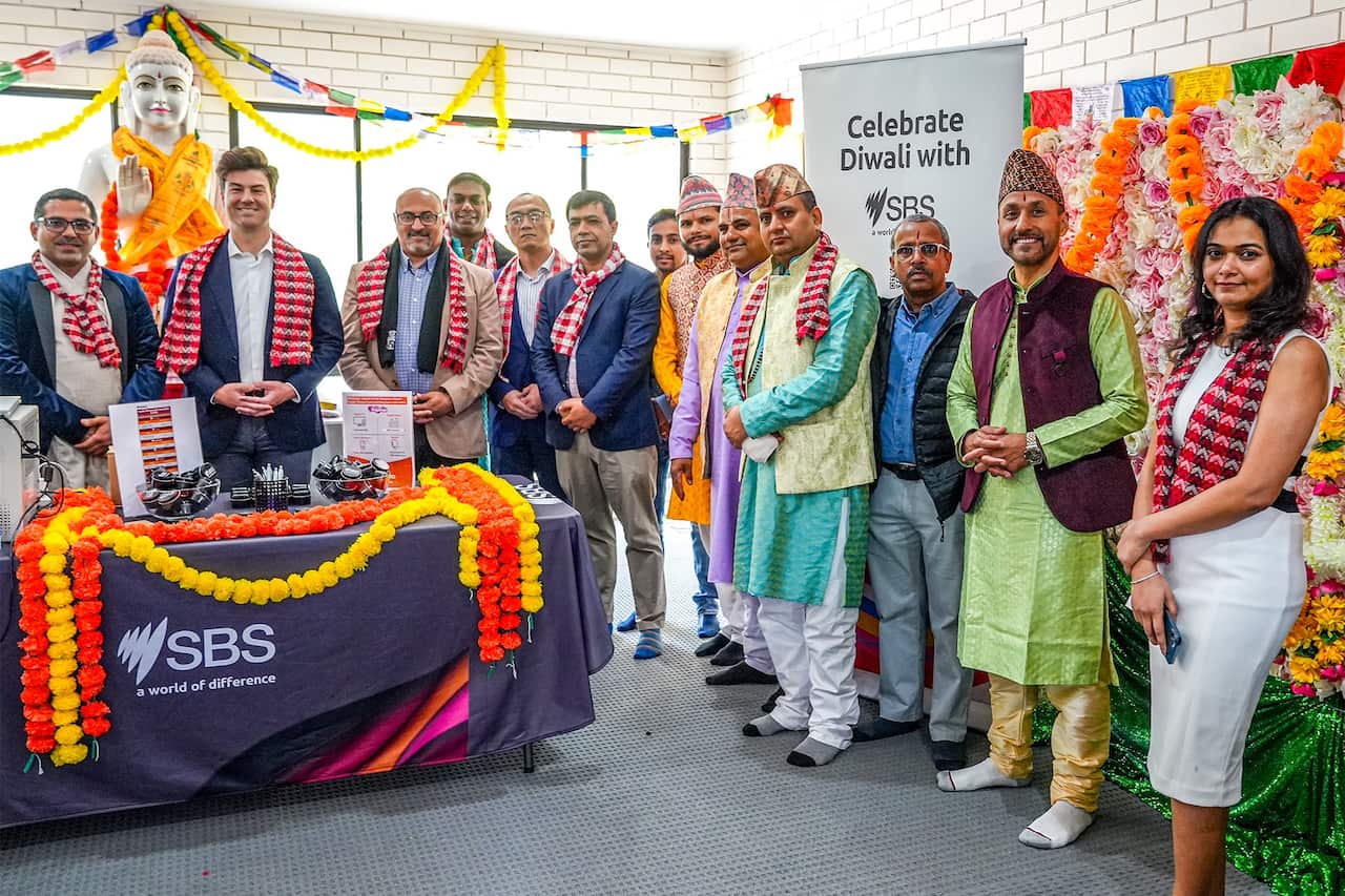 Federal MPs and community leaders gather at the Buddha Stupa in ANMC.