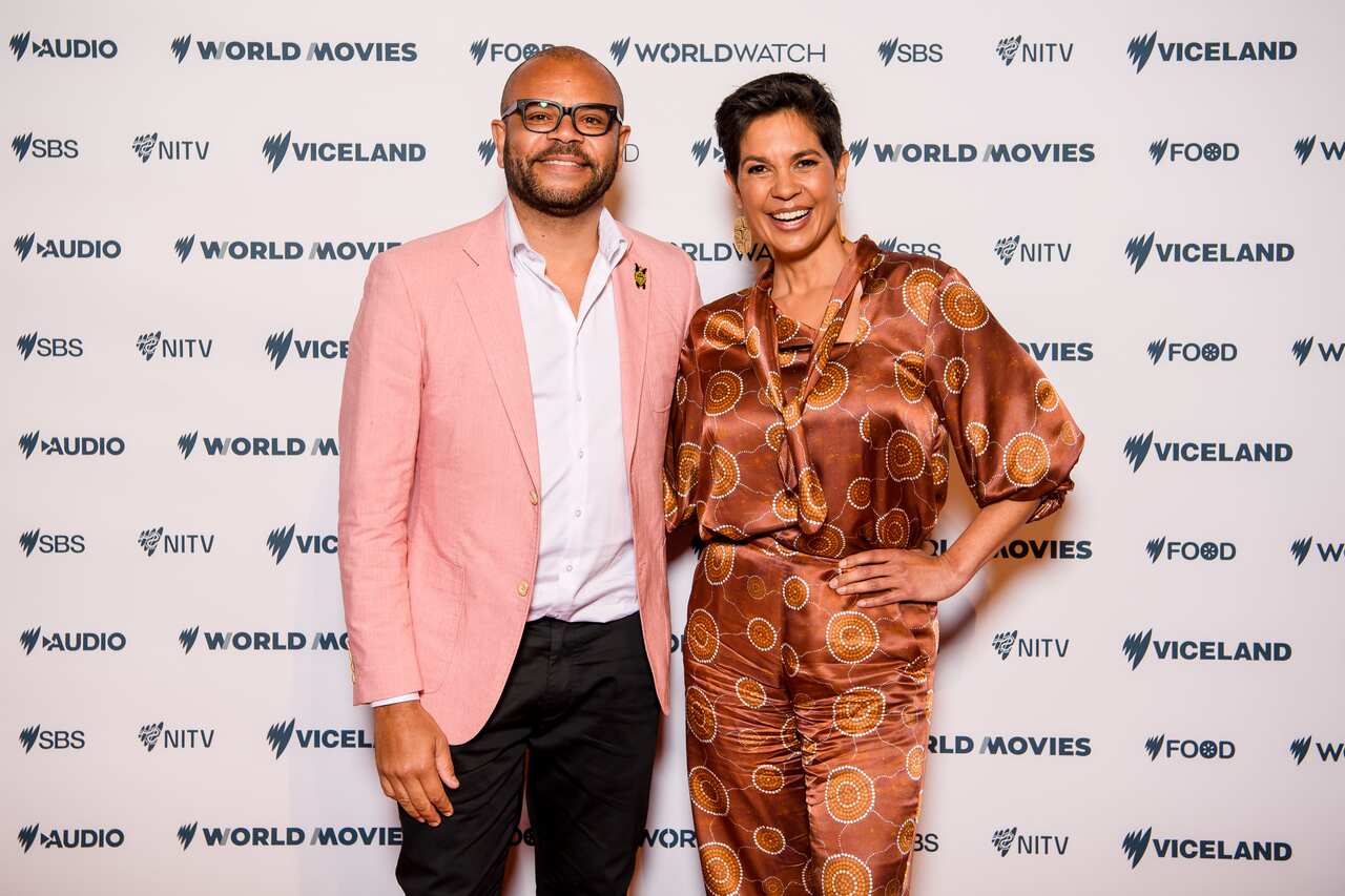 Luke Carroll and Narelda Jacobs pose for a photo together