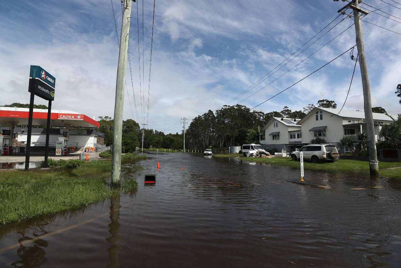 The impact of the latest round of floods on Ewingsdale Road in Byron Bay on 31 March 2022. 