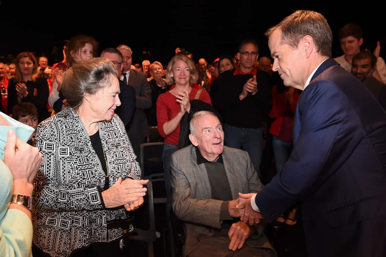 Bill Shorten (right) greets former Labor leader Bill Hayden and his wife Dallas Hayden at a Labor Party Rally.