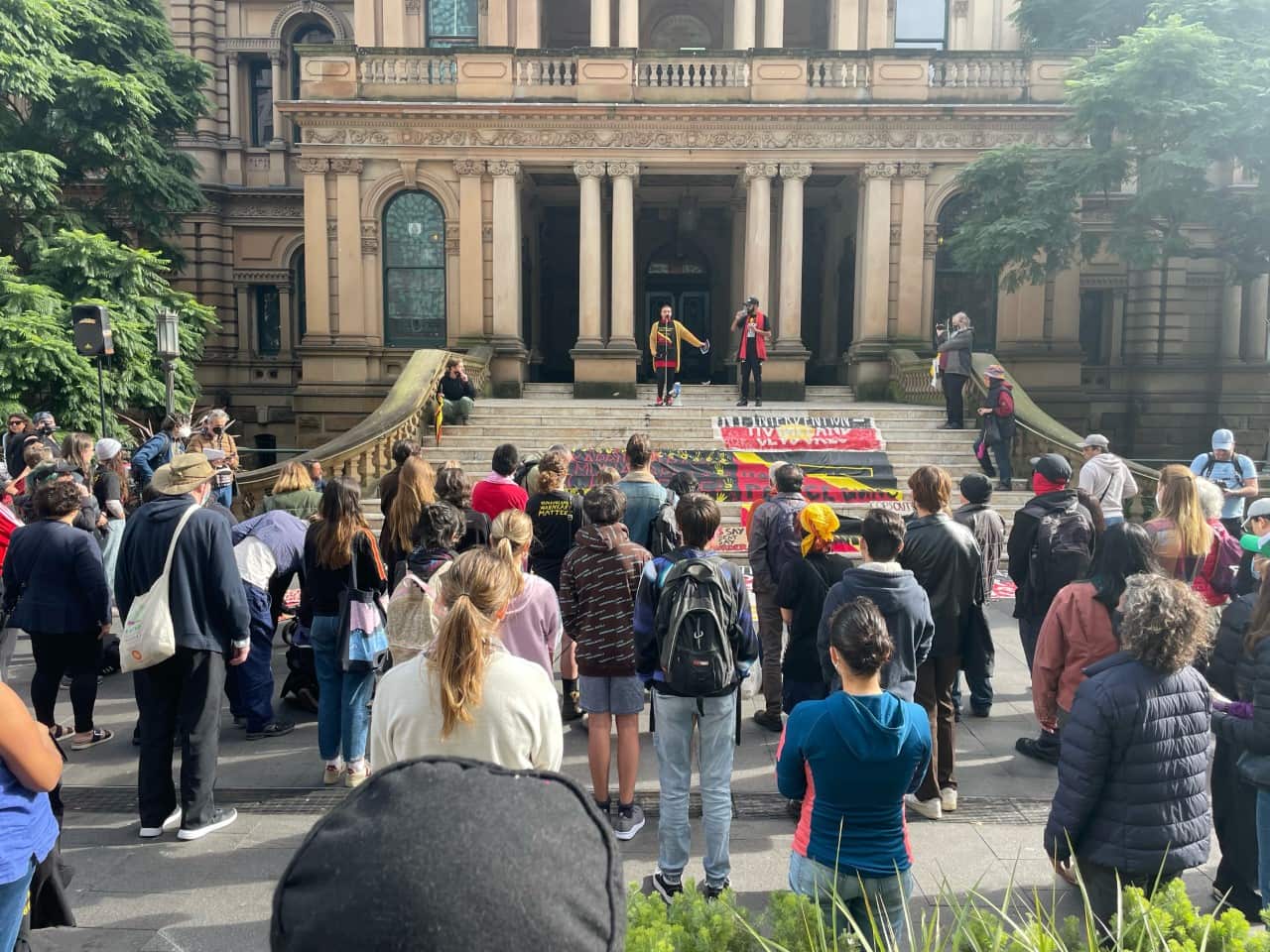 Protesters holding signs