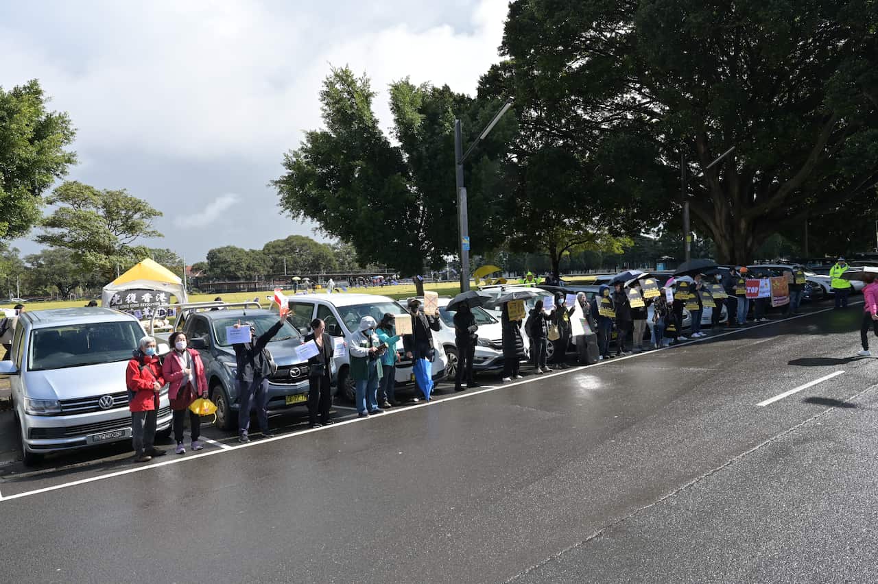 Protesters gathering outside Experience Hong Kong event on Saturday, August 27, 2022.