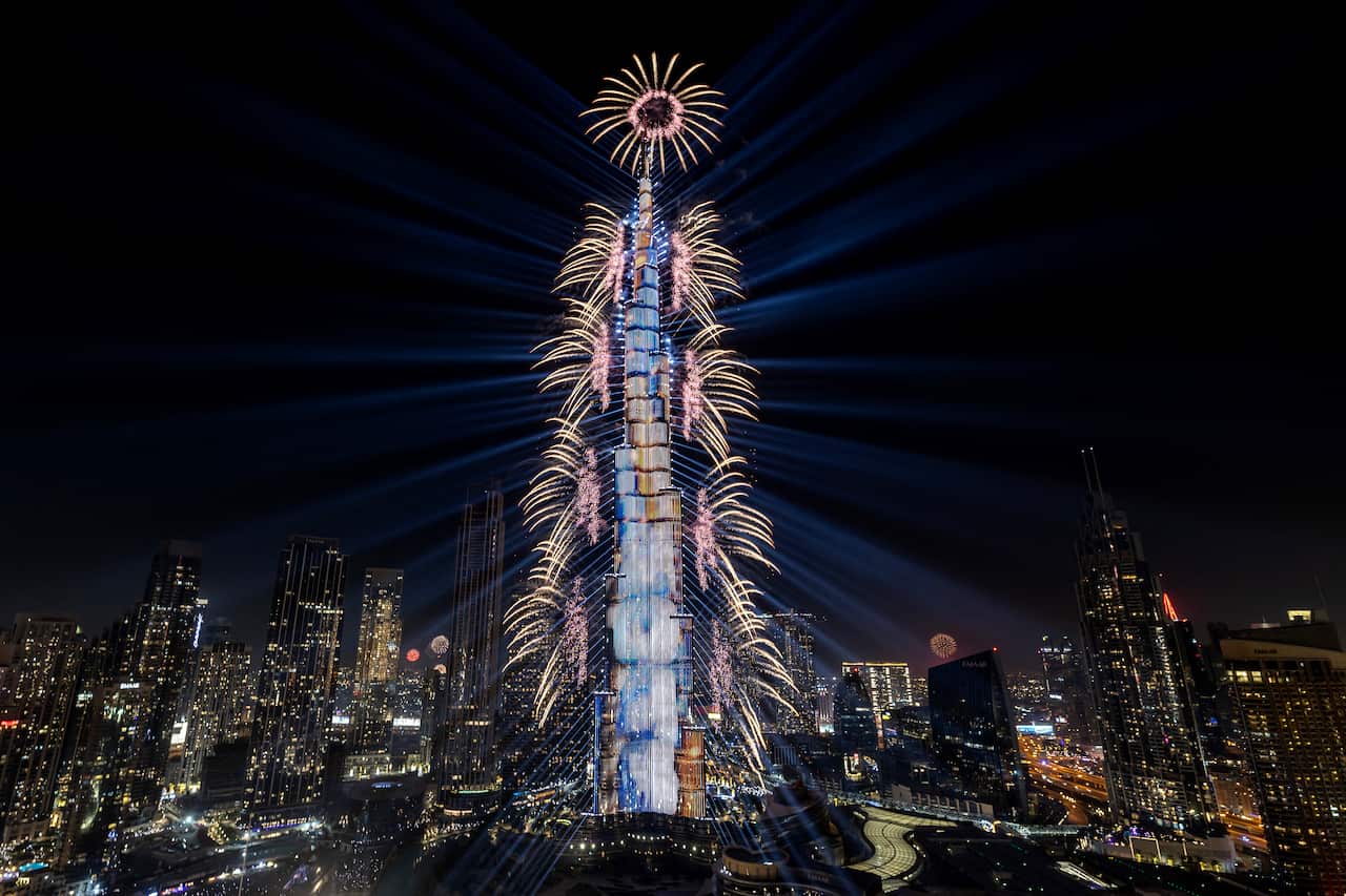 A light show and fireworks illuminate  the world's tallest building