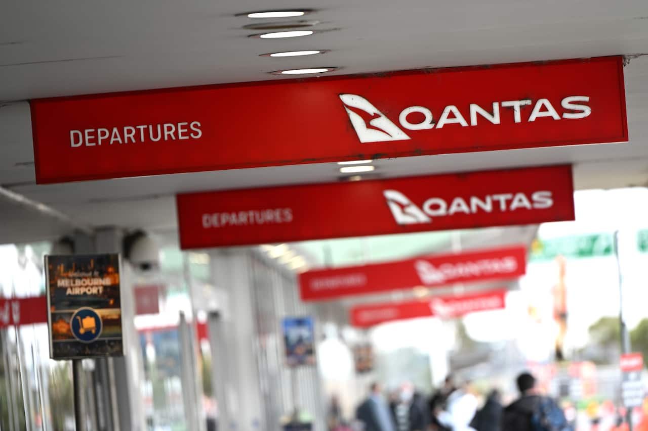 Qantas airport signs