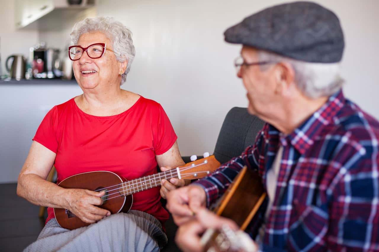 Senior couple playing music - Australia Explained – Learning an instrument