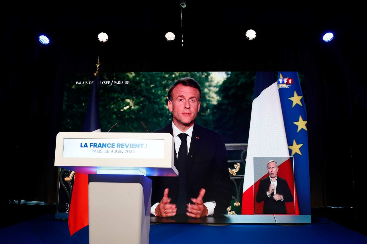 French President Macron speaking in a televised address