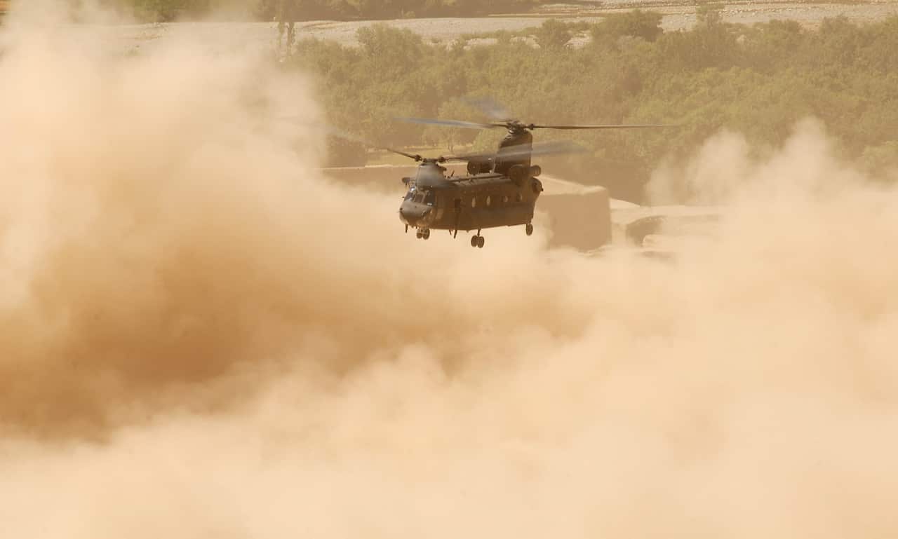 Supplied image obtained Monday, Sept. 23, 2013; An Australian CH 47 Chinook helicopter takes off in a cloud of dust at the construction site of a patrol base in Uruzgan Province.