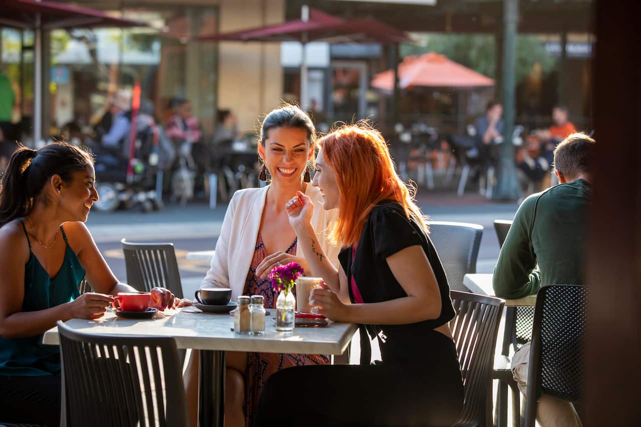 Coffee And a Catch up in The Sun