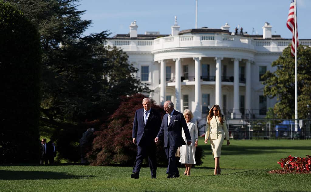 From left, Donald Trump, King Charles, Queen Camilla and Melania Trump walks across the lawn at the White House.