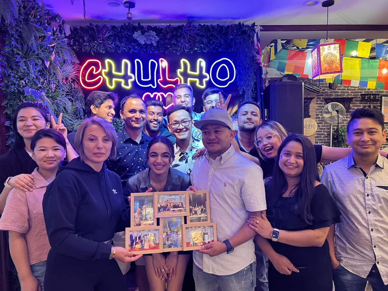 Sujan Shrestha (in the middle with white shirt) and Prajwal Shrestha (right) along with their colleagues from On Sunset restaurant..jpg