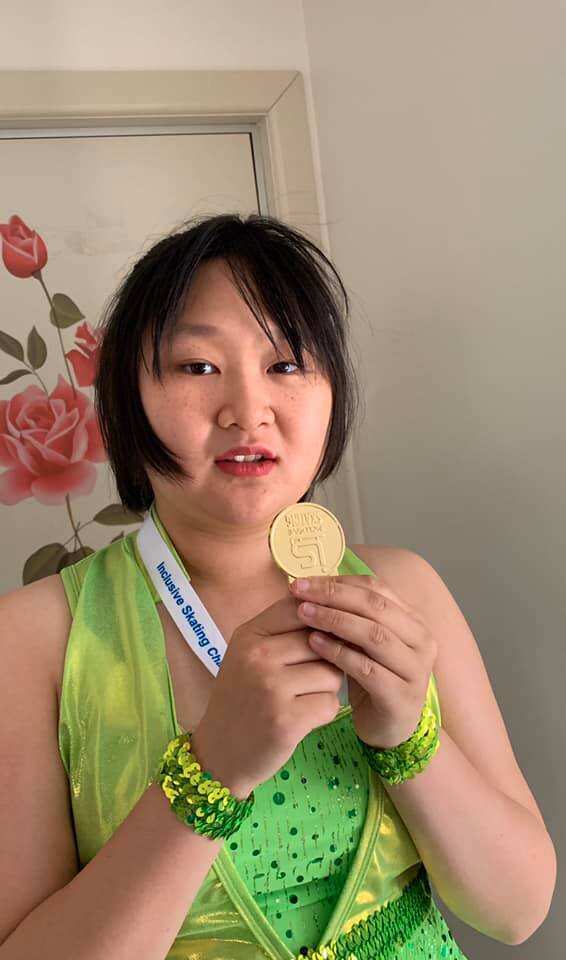 Catherine and her first Golden Medal Inclusive Skating 2019.jpg