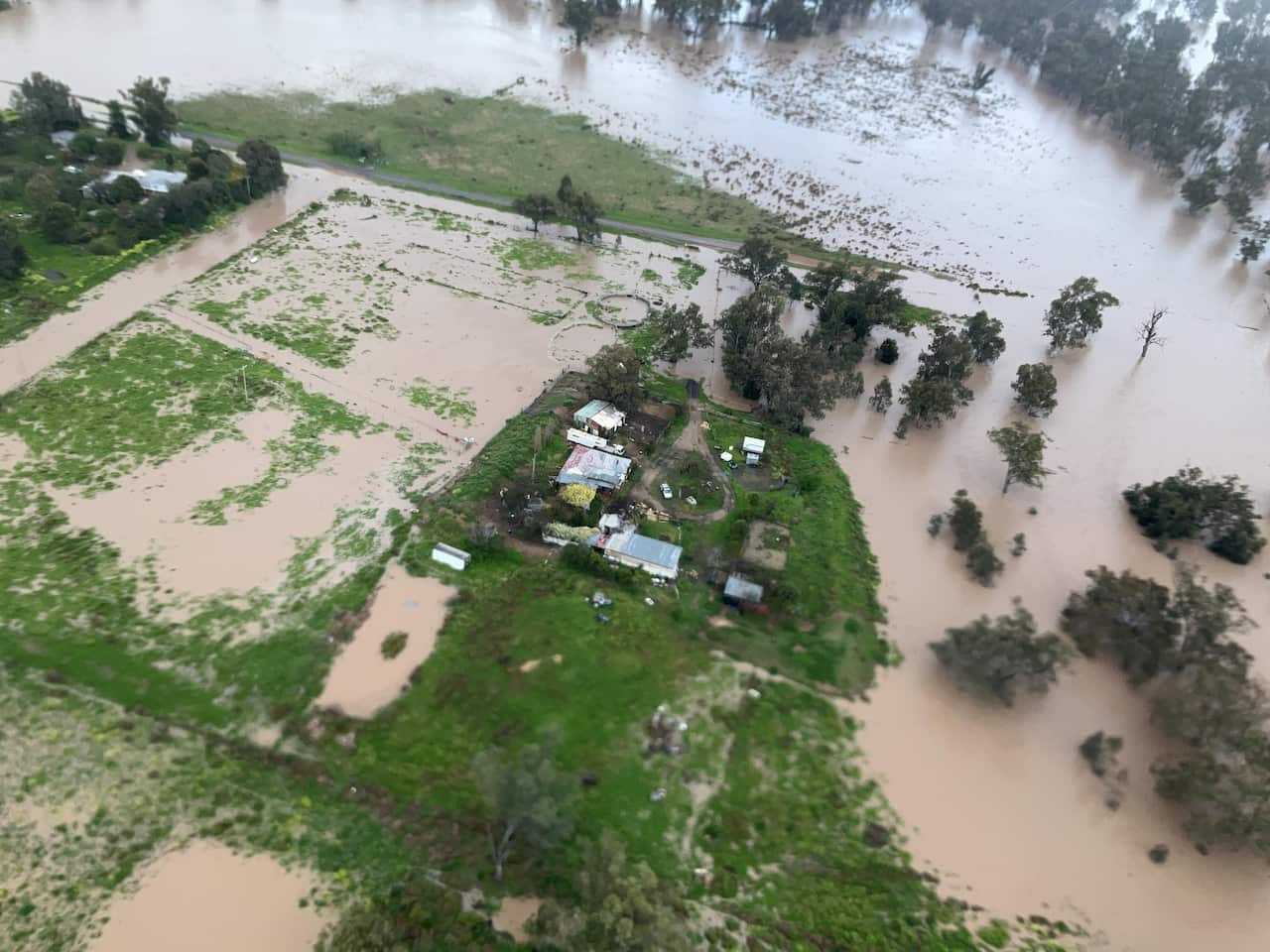 A house is surrounded by water in Gunnedah. 