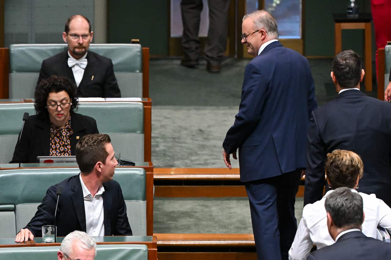 Anthony Albanese speaks to Max Chandler-Mather as he leaves the House of Representatives.