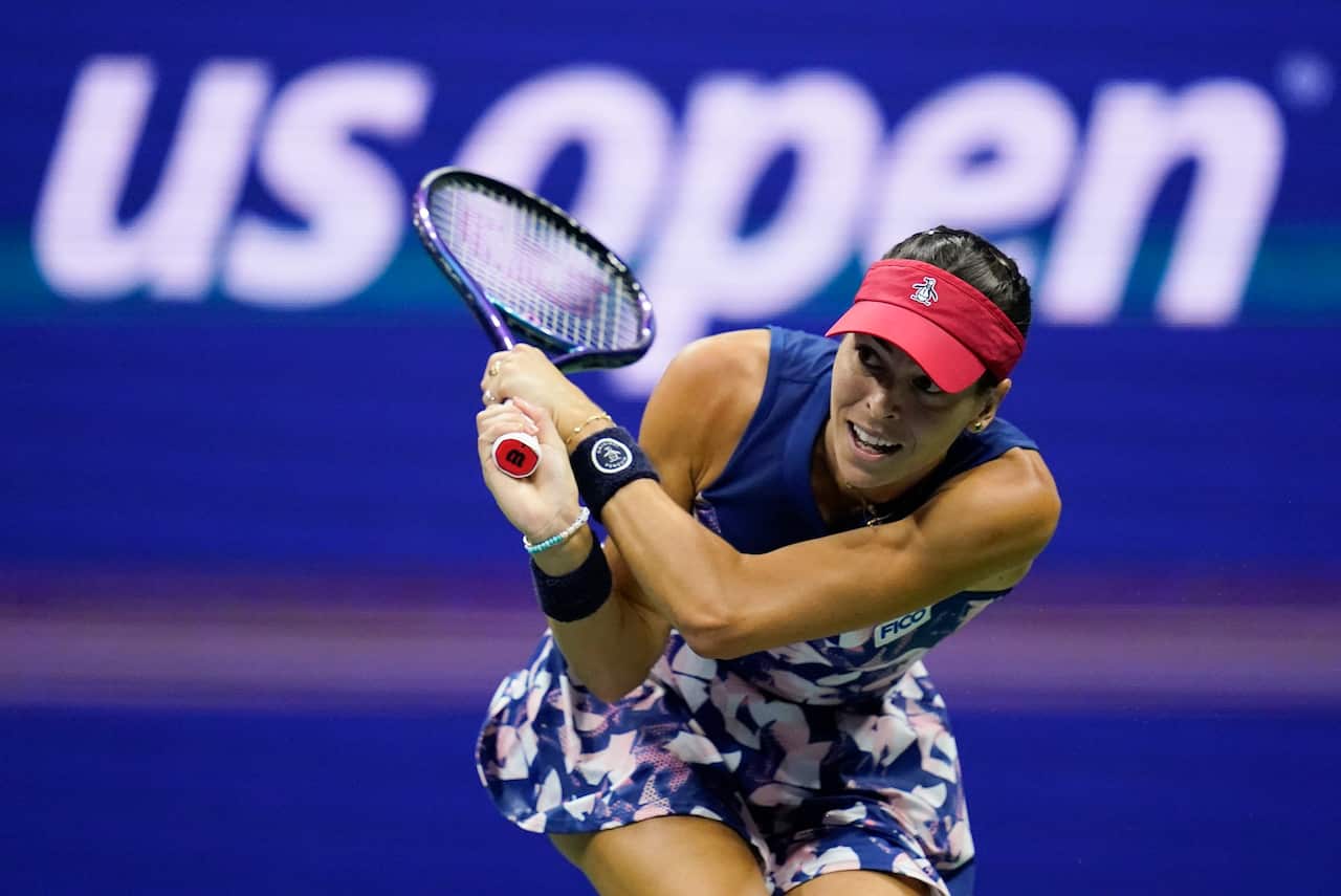 Ajla Tomljanović returns a shot to Serena Williams during the third round of the US Open.