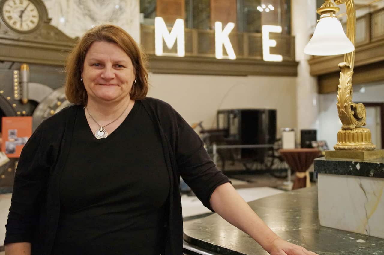 A woman wearing black.