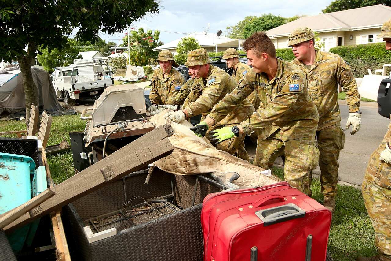 Members of the Army arrive in Fairfield to help residents with clean up in Brisbane on 4 March 2022.