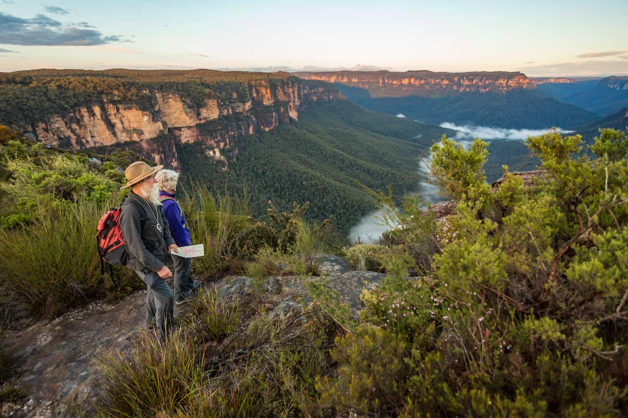 Senior Couple Looking at View While Bushwalking in Australia