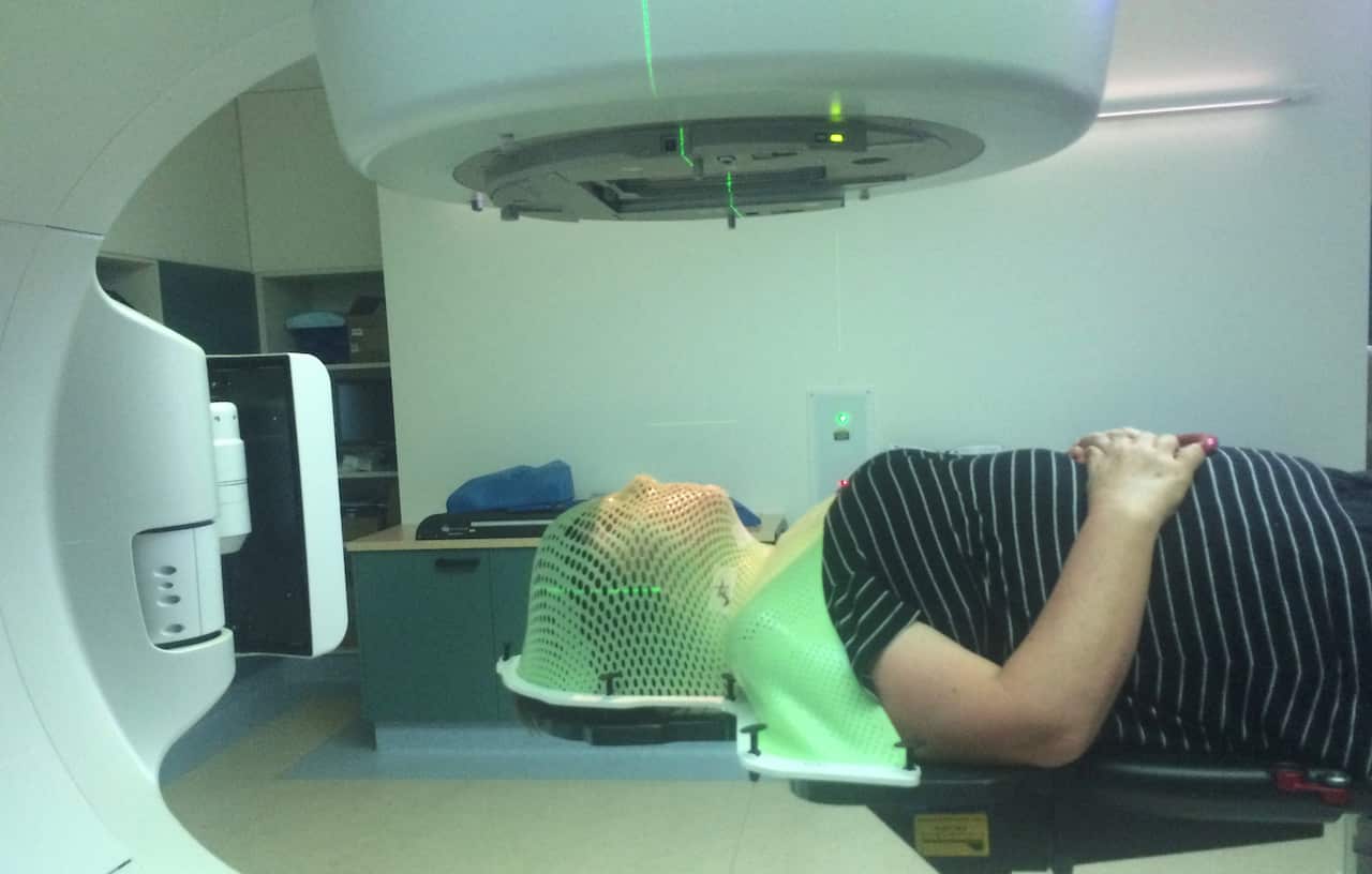 Julie receiving radiation therapy