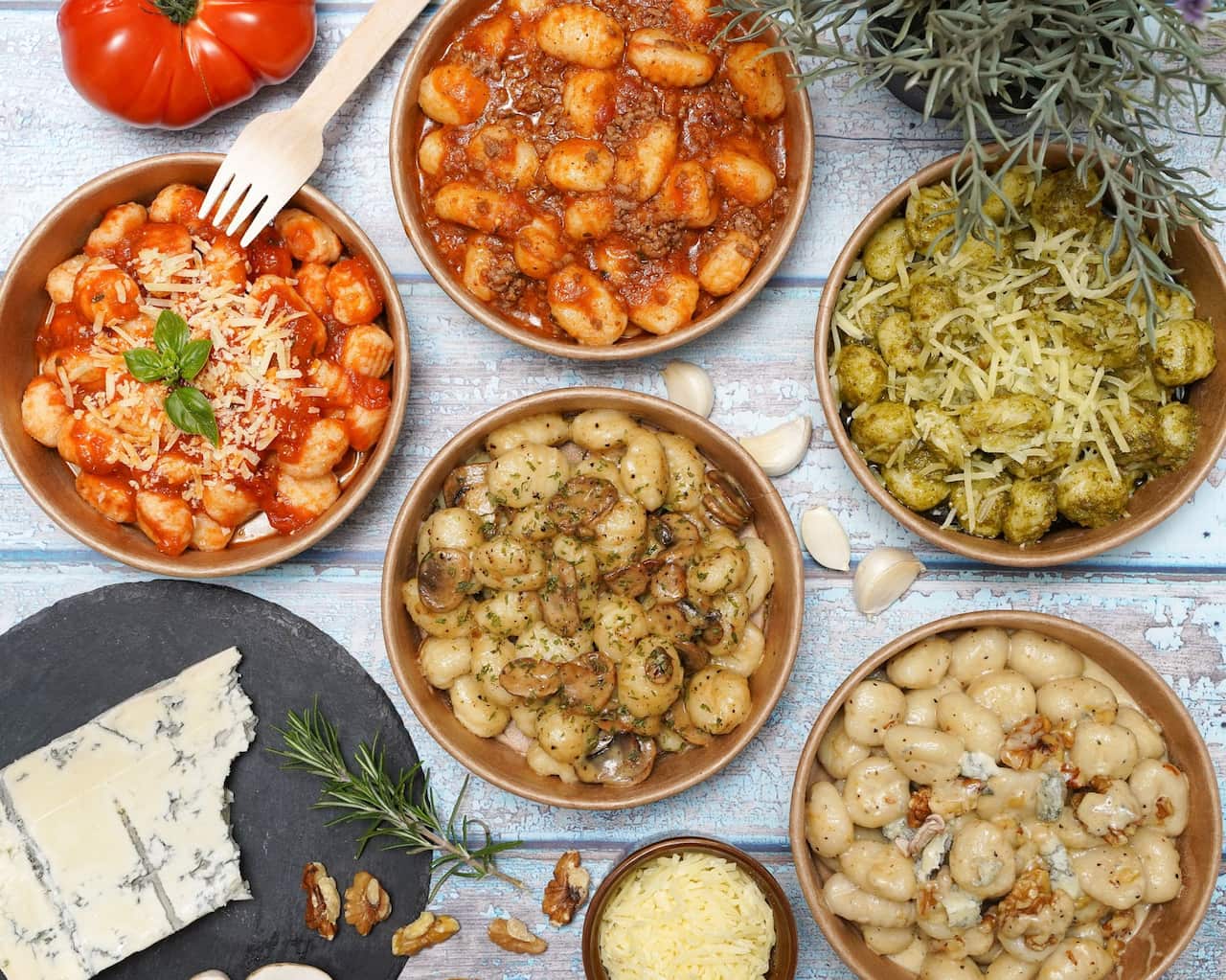 Gnocchi in takeaway bowls with different sauces made by The Gnocchi Way