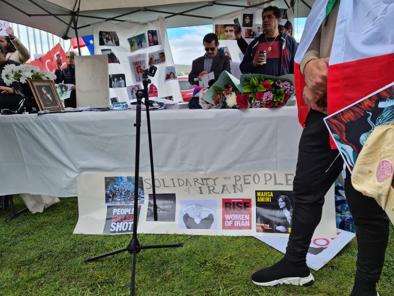 Iranian protesters rally in front of Australian parliament in Canberra