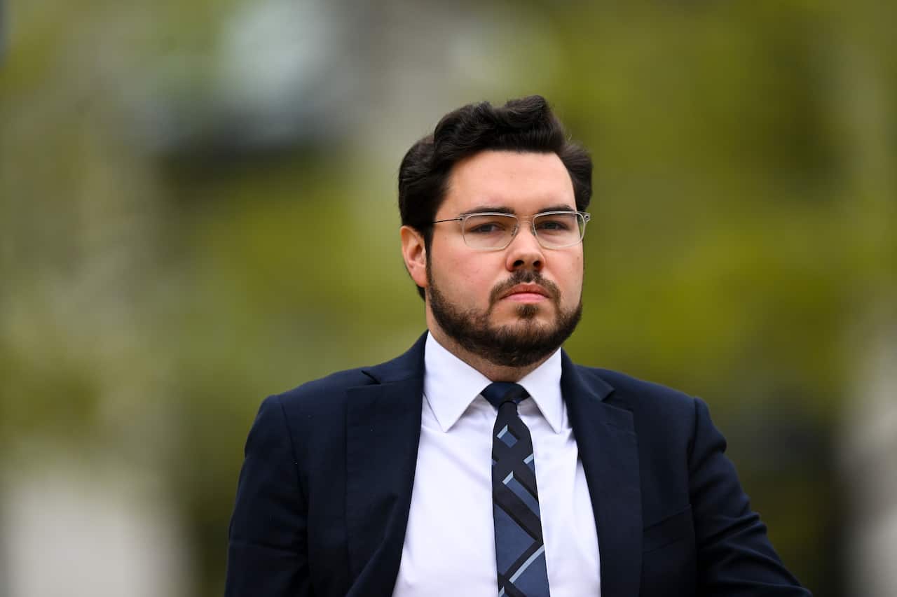 Bruce Lehrmann in a suit and tie.