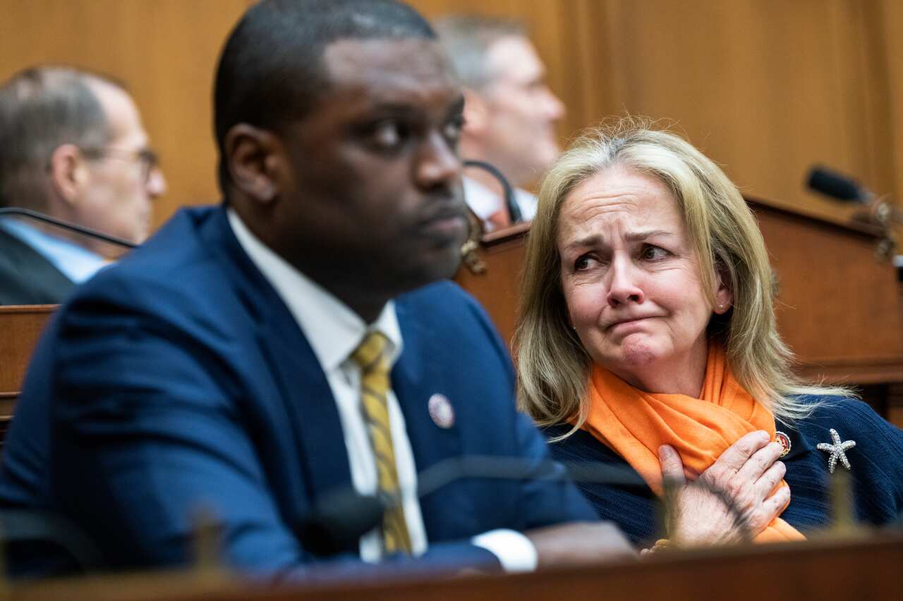 A man and a woman sitting next to each other
