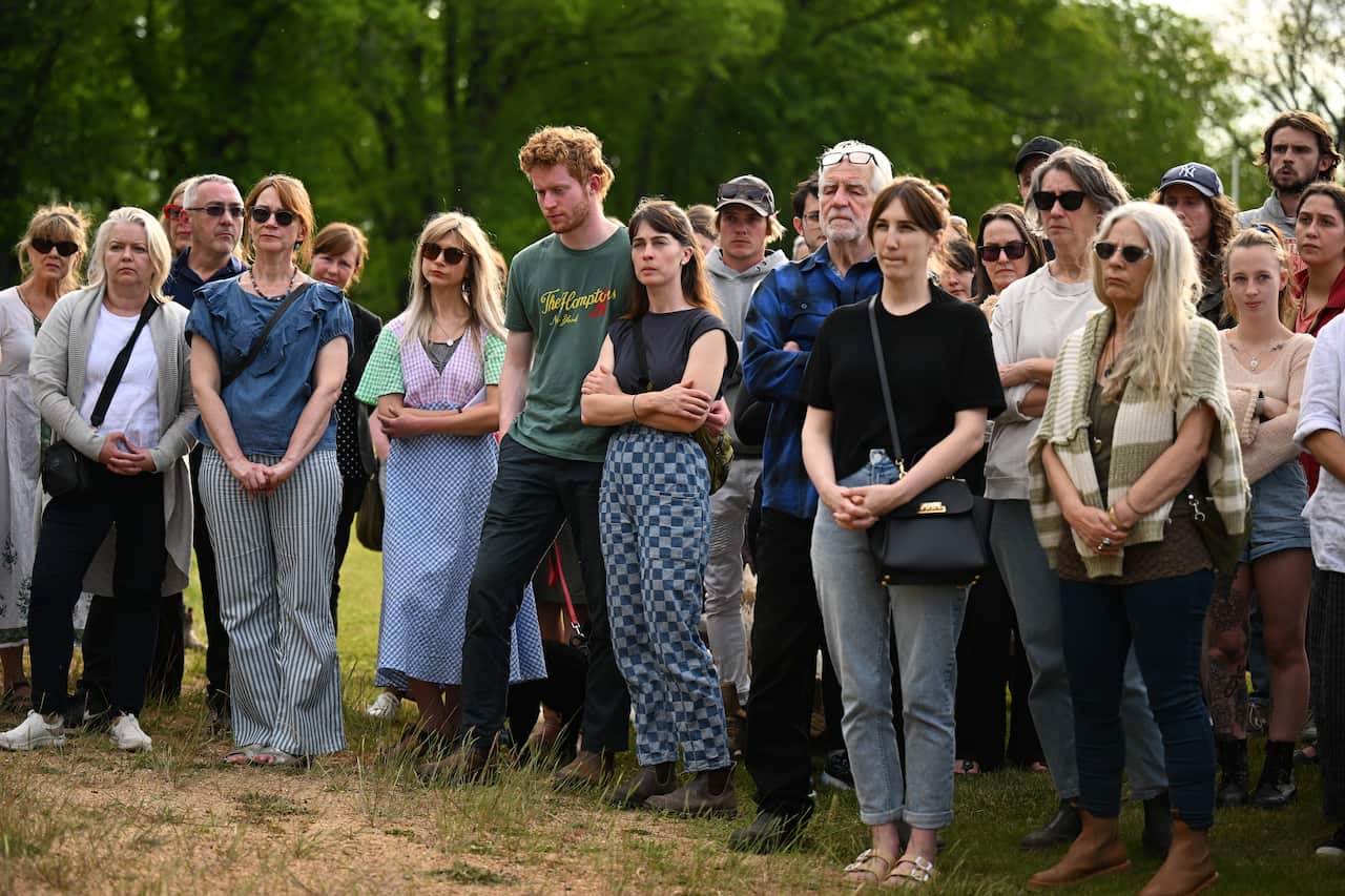 Mourners stand vigil at crash site