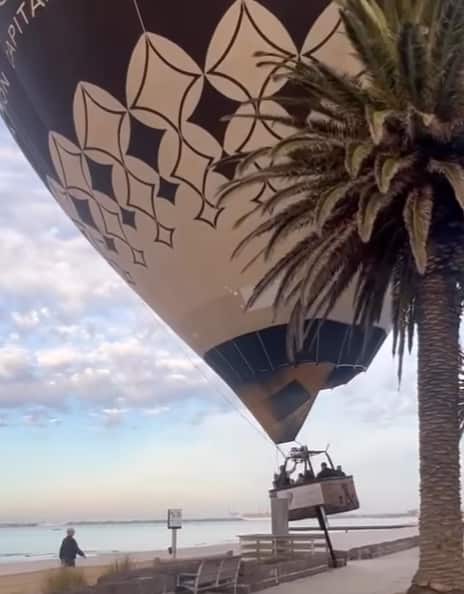 Hot air balloon emergency landing on St Kilda Beach