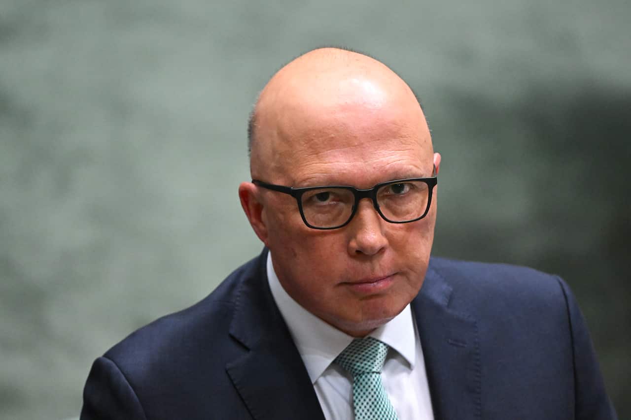 Peter Dutton reacts during a parliamentary session.