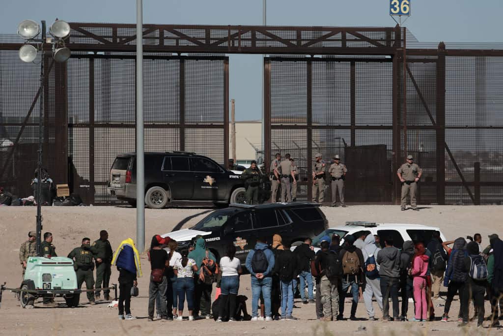 Migrants cross the Rio Grande in Ciudad Juarez