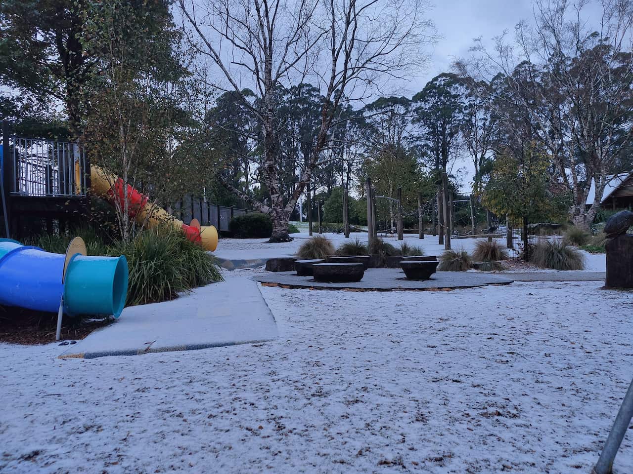 Playground covered in snow