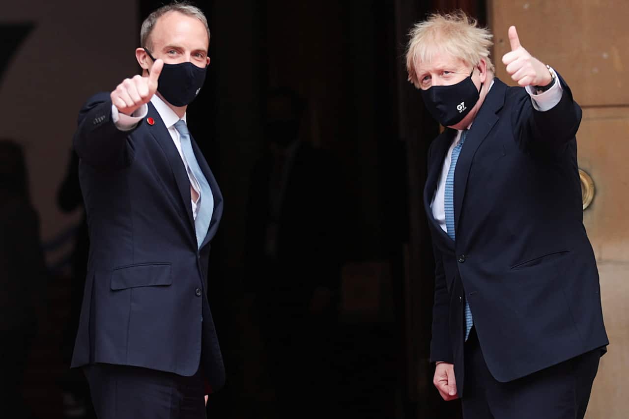Boris Johnson (right) and Dominic Raab arrive for the G7 foreign ministers' meeting on 5 May 2021 in London. 