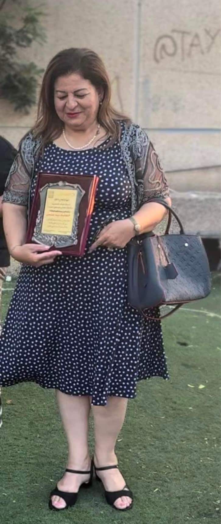 الروائية دينا حنحن - في أحد المناسبات التكريمية.jpg