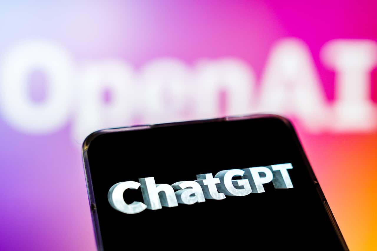 The logo of ChatGPT is displayed on a smartphone.