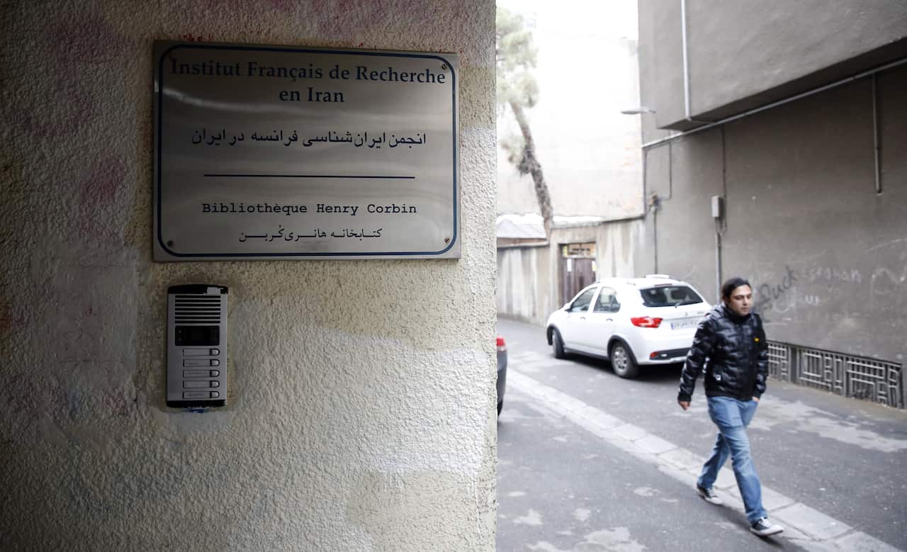 A sign reads French Institute for Research in Iran
