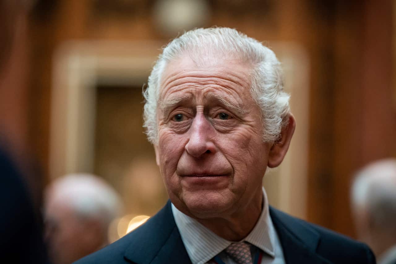 A man wearing a suit and tie.