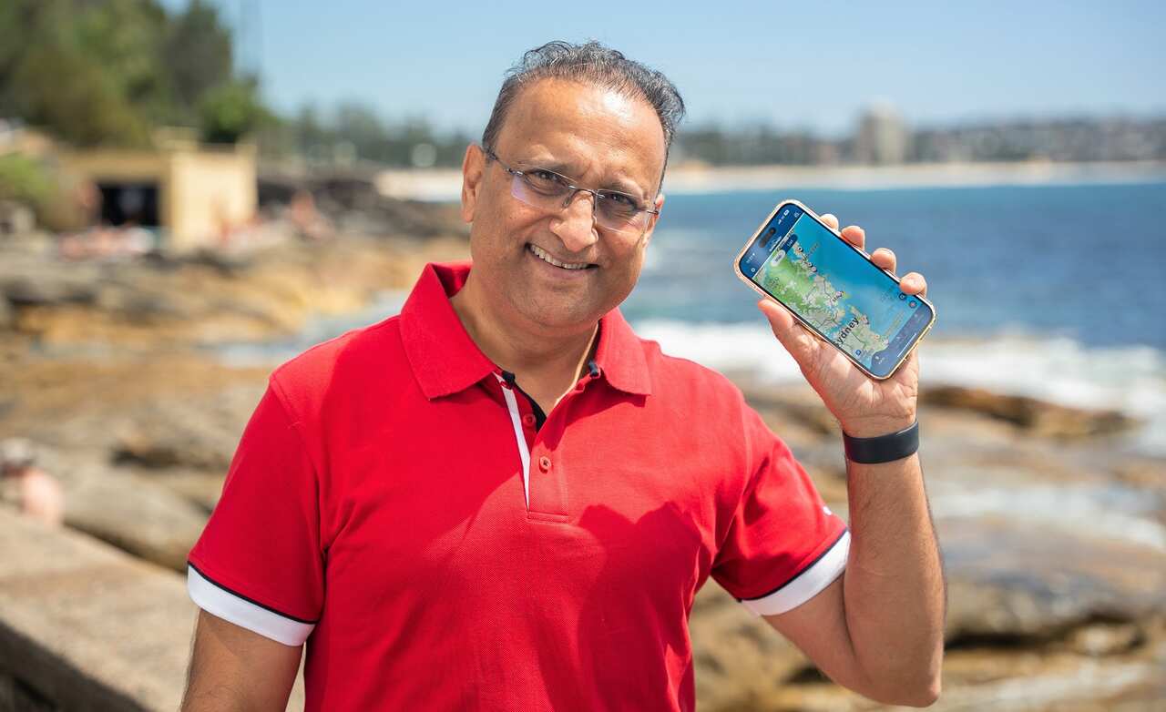 Mrudul Vasavada shows his SharkSmart app (Spencer Austad, SBS).jpg
