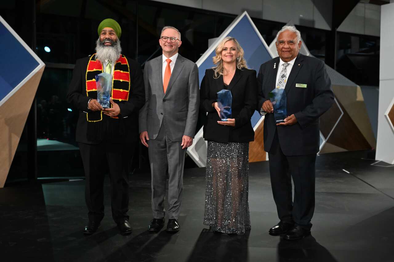 Local Hero Amar Singh, Prime Minister Anthony Albanese, Australian of the Year Taryn Brumfitt and Senior Australian of the Year Tom Calma at the 2023 Australian of the Year Awards ceremony in Canberra