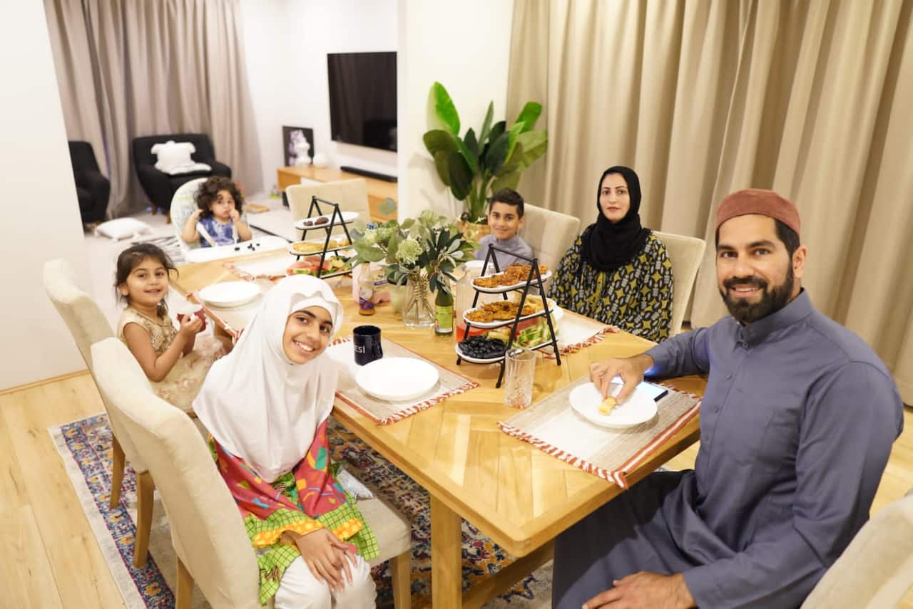 Taufiq Rind with Family on Iftar table.jpg
