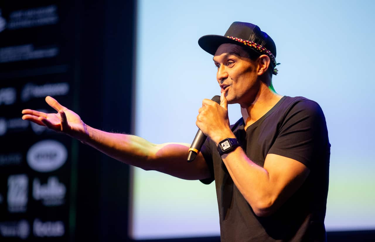 Comedian Andy Saunders performing a set on stage