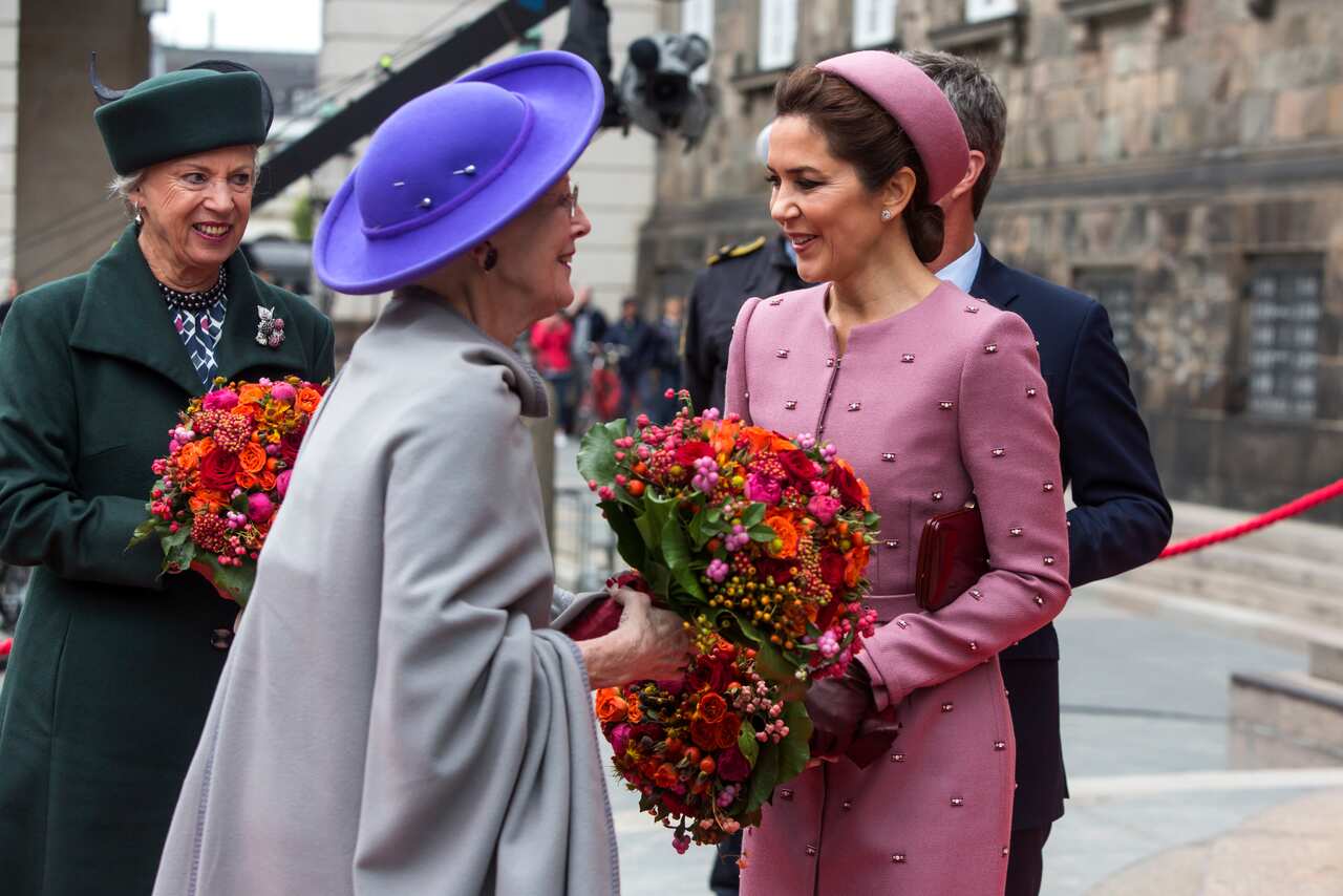 Queen Margrethe of Denmark greets Australian-born Princess Mary