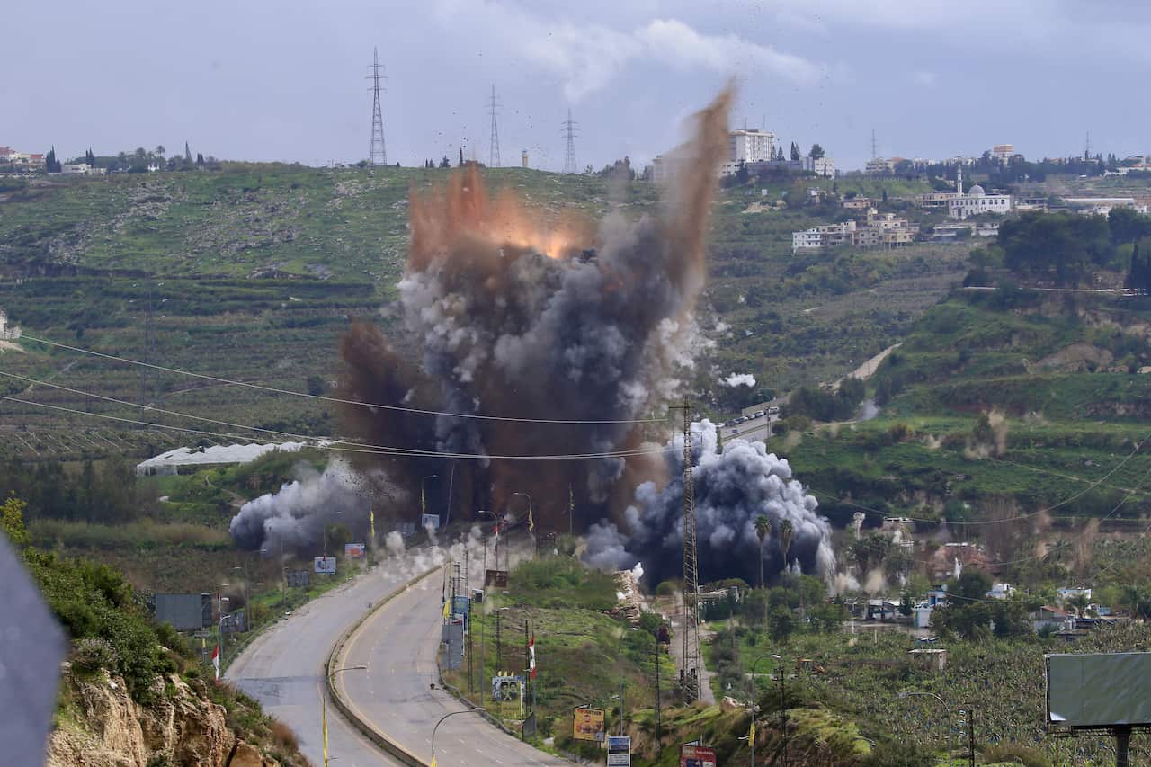 Israel strikes a bridge connecting southern Lebanon to the north
