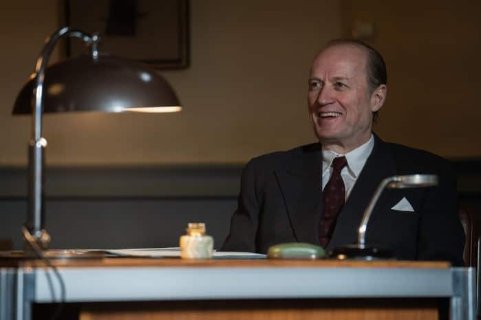 Adrian Edmondson as Sir Roger Hollis.