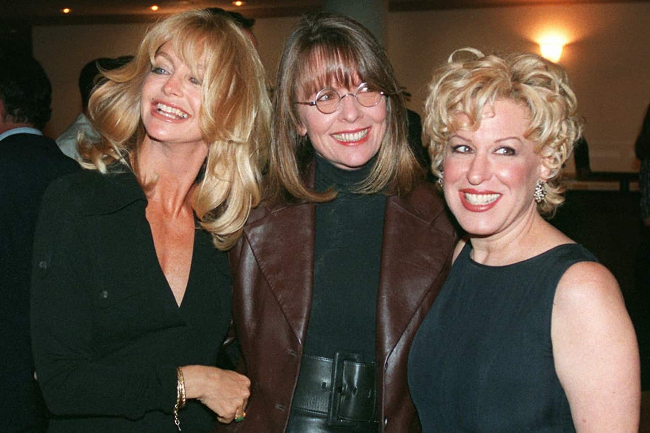 Goldie Hawn, Diane Keaton and Bette Midler appear at a movie premiere. 