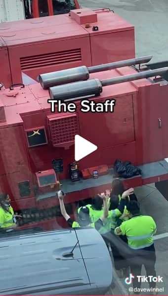  Airport staff dancing at the apron
