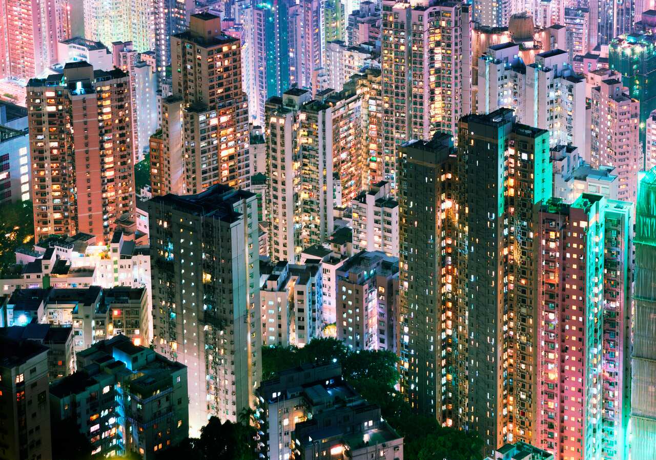 China, Hong Kong, apartment blocks at night