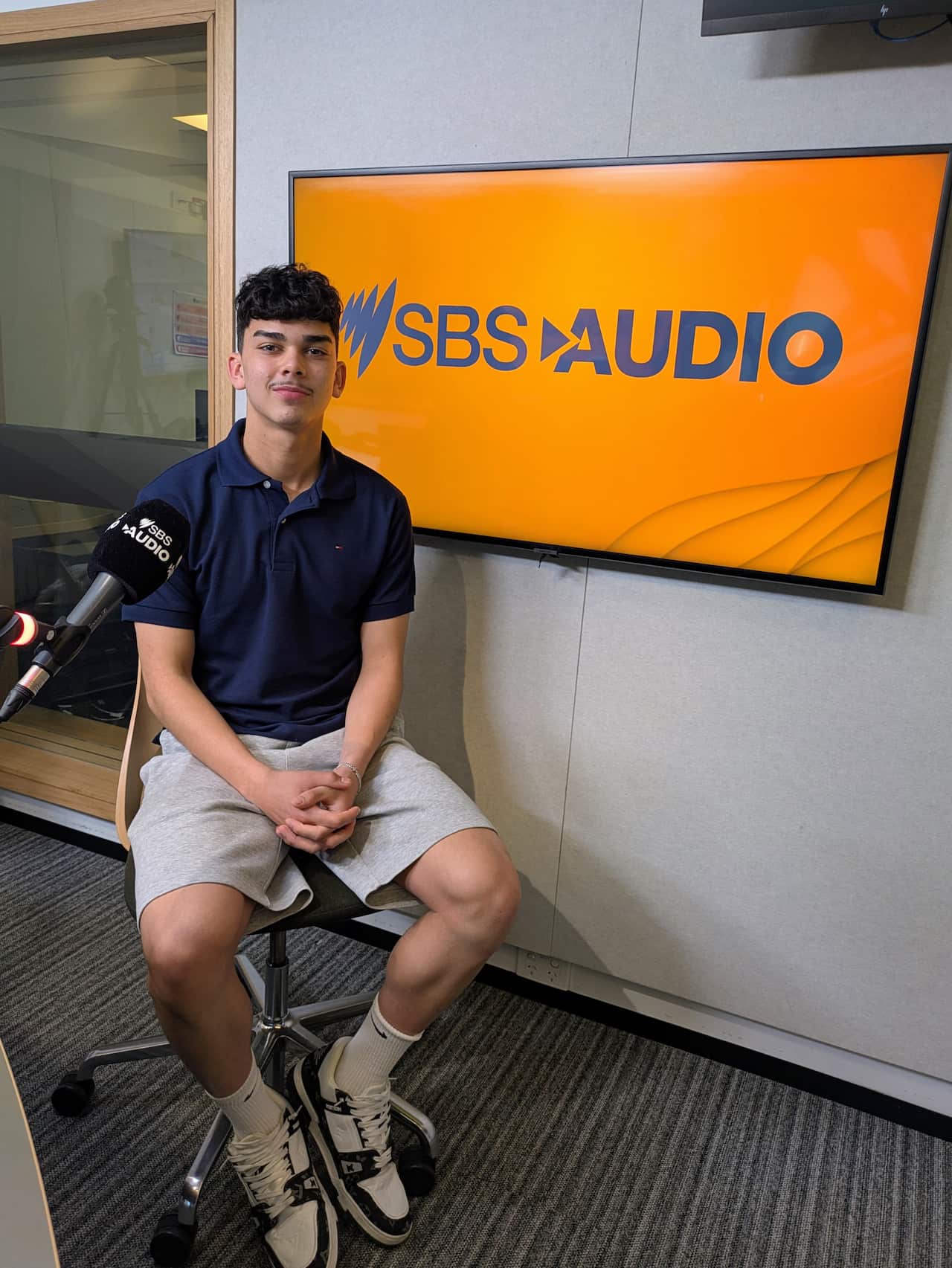 Mathew Baker at the SBS studio in Fed Square, Melbourne, on 8 July 2026.