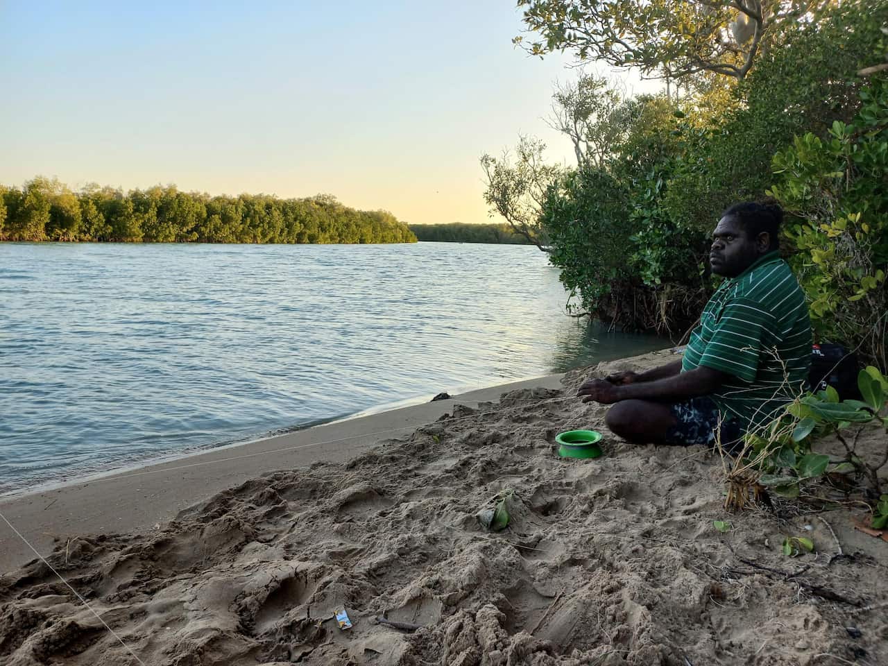 Student Eddie Albert fishing at Wuyagiba